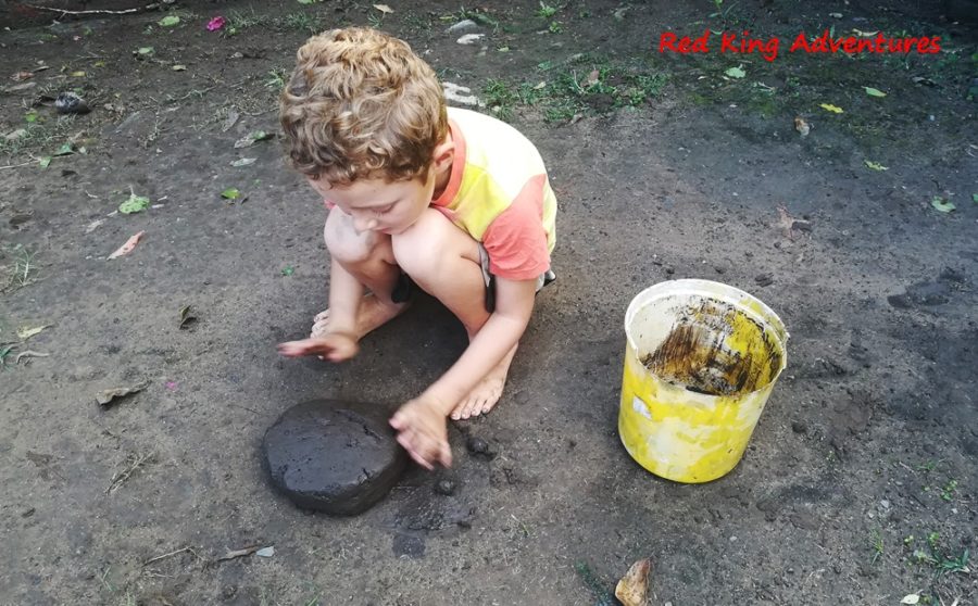 kids playing in the mud